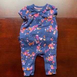Ruffle bottom onesie